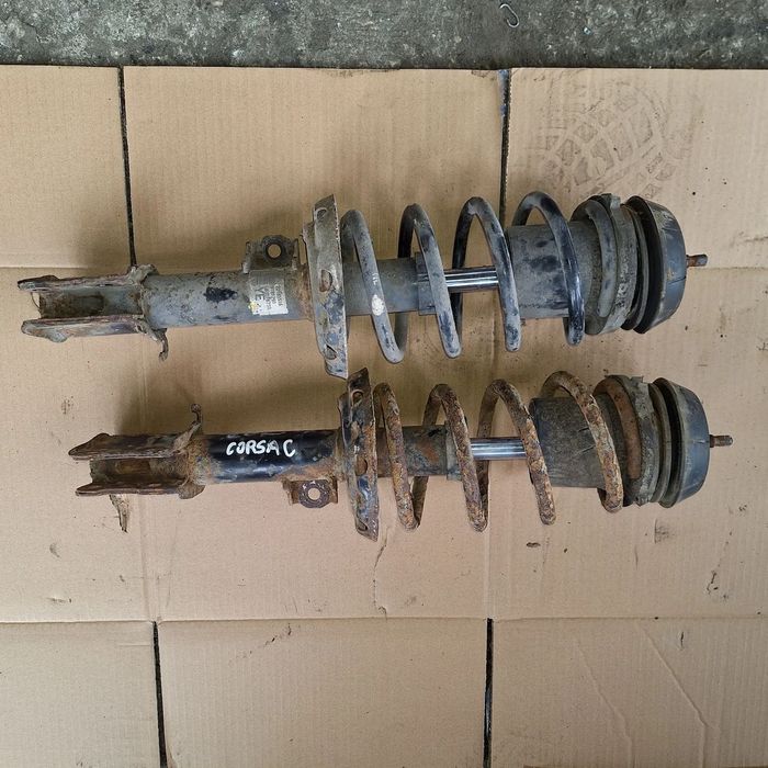 MCPERSON PRAWY LEWY PRZOD CORSA C 1.2 B