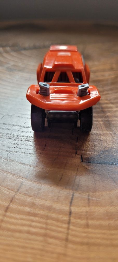 Samochodzik Hot Wheels Mattel pomarańczowy Land Crusher