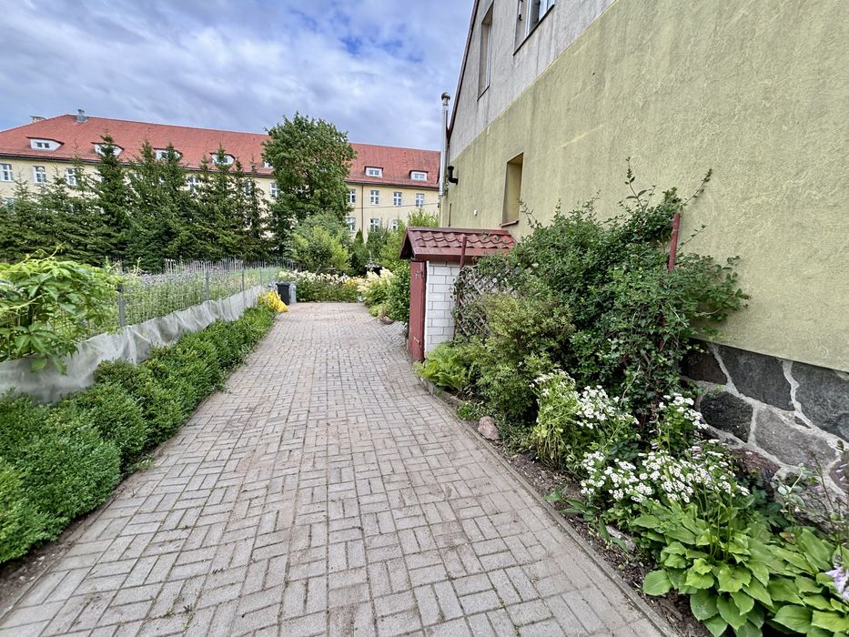 Mieszkanie z ogrodem i sadem na obrzeżach miasta