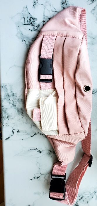 Розовая поясная сумка