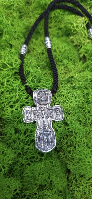 Срібний хрест на шовковому шнурку