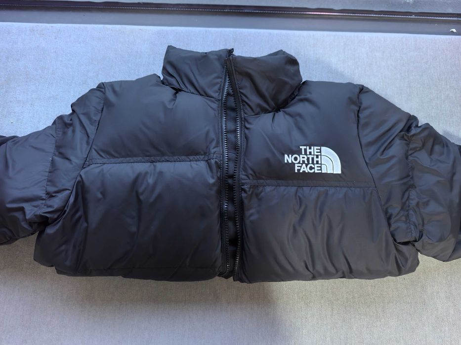 Czarny uniwersalny kurtka puchowa – modna i ciepła!