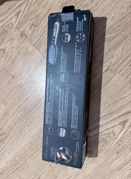 Escova de alisar o cabelo