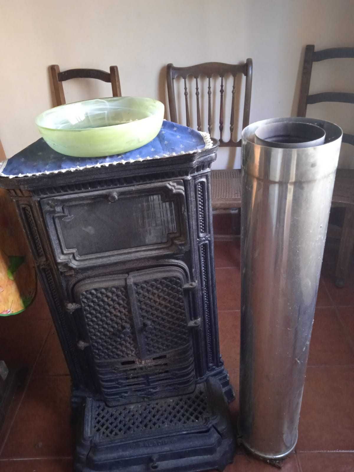 Fogão de sala  com tubagem térmica