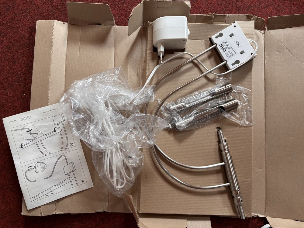 Nowa lampa ścienna IKEA nad obraz Piccola