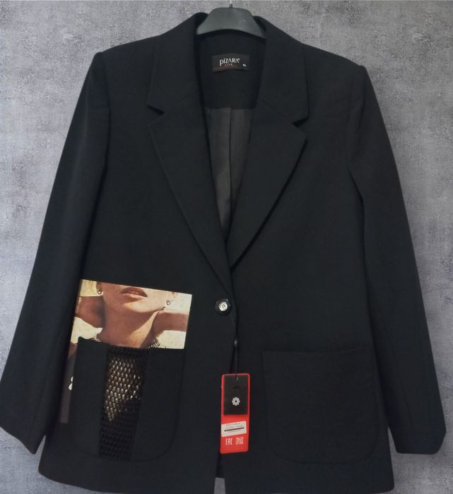 Жіночий піджак .