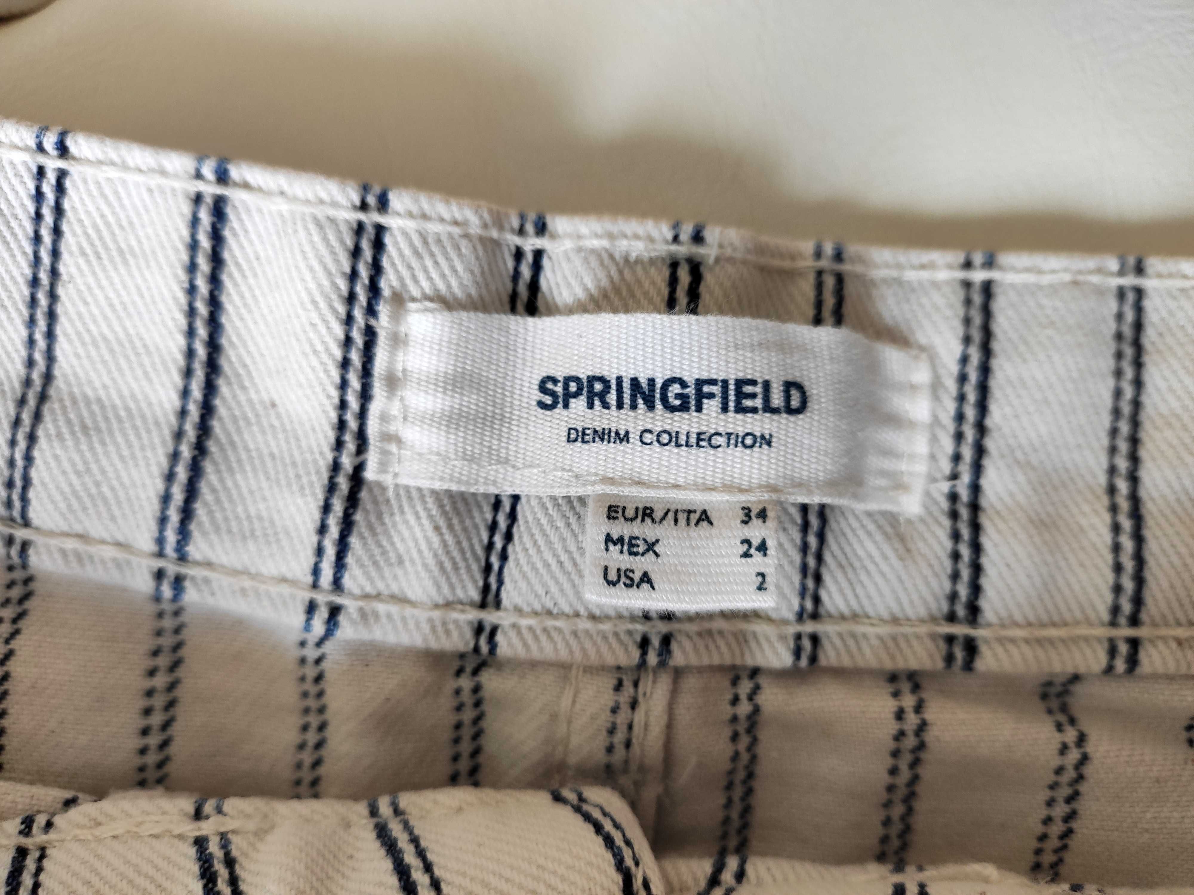 Saia da marca Springfield, de cor cru com linhas pretas