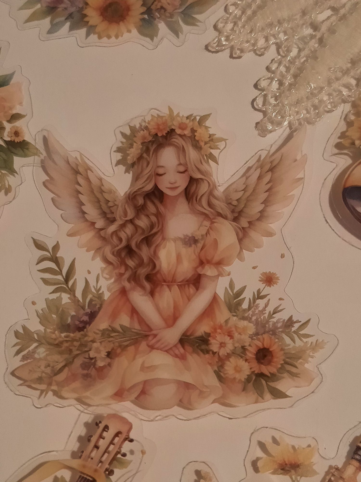 15 stickers, anjos e instrumentos musicais com girassóis. Scrapbooking