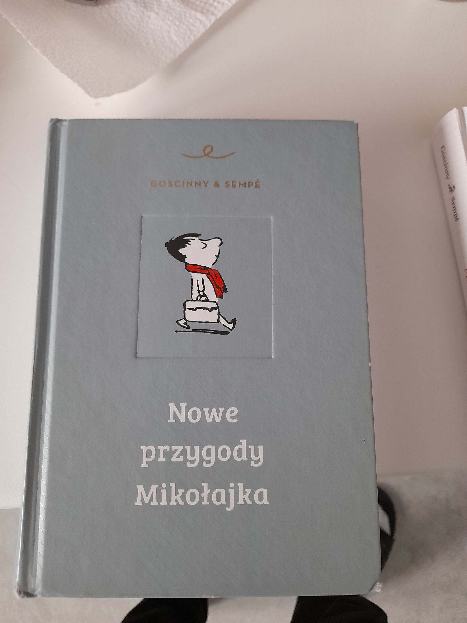 Książki "Mikołajek spolka" i "Nowe przygody Mikolajka"