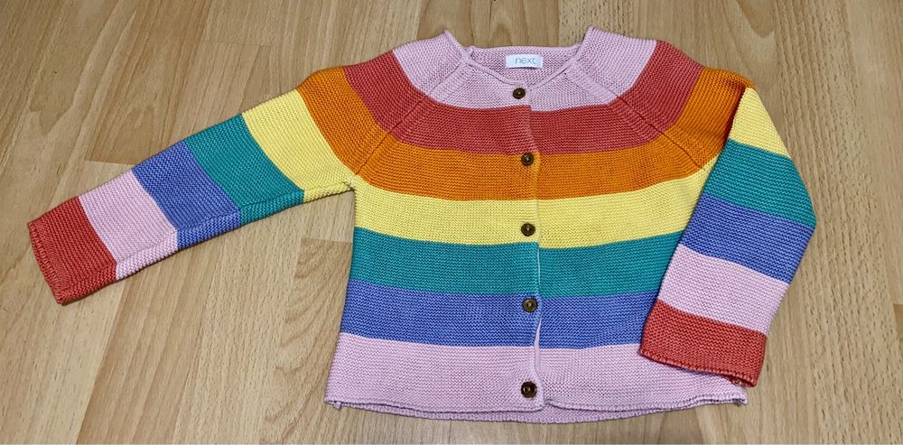 Kolorowy sweterek dziewczęcy Next