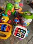 Zestaw zabawek, książeczki sensoryczne, grzechotki, Fisher Price