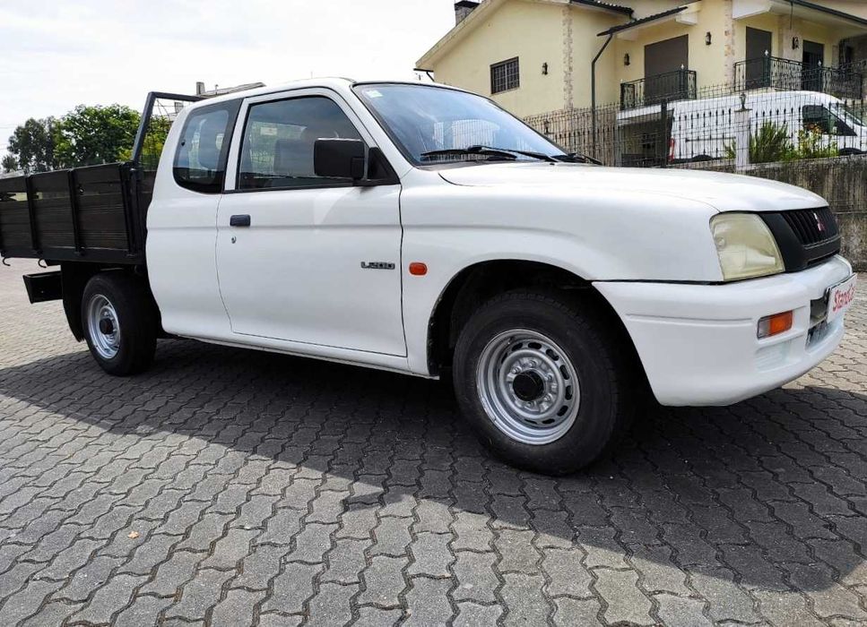 Mitsubishi l200 4 lugares