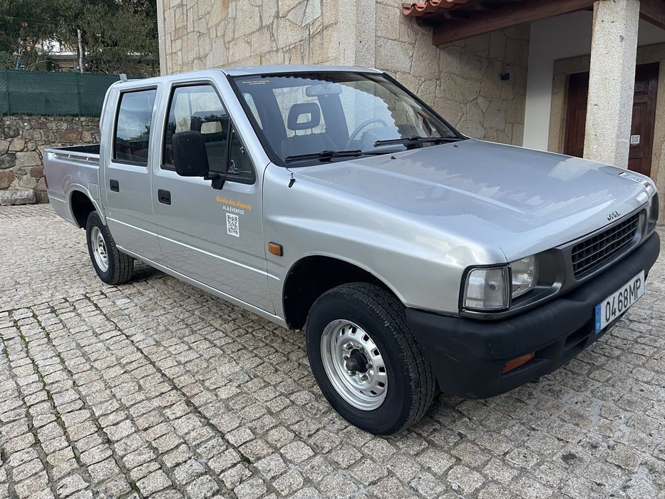 Pick-up 5 lugares, 4x2, caixa aberta