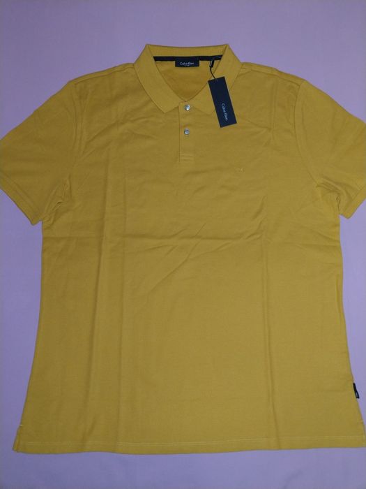 Wyprzedaż polo męskie Calvin Klein.