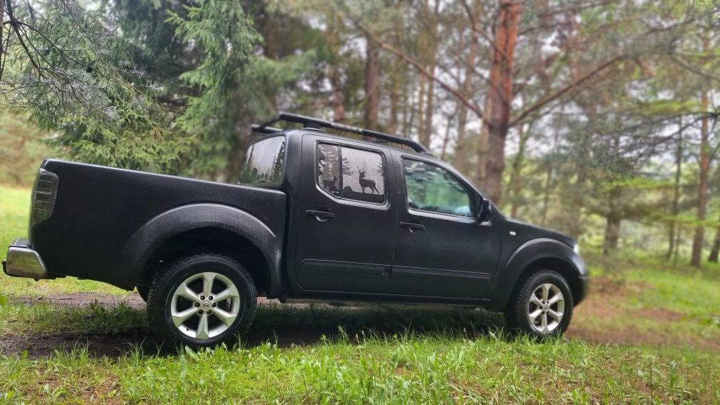 Nissan navara d40 raport