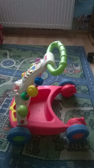 Jeździk Fisher Price.