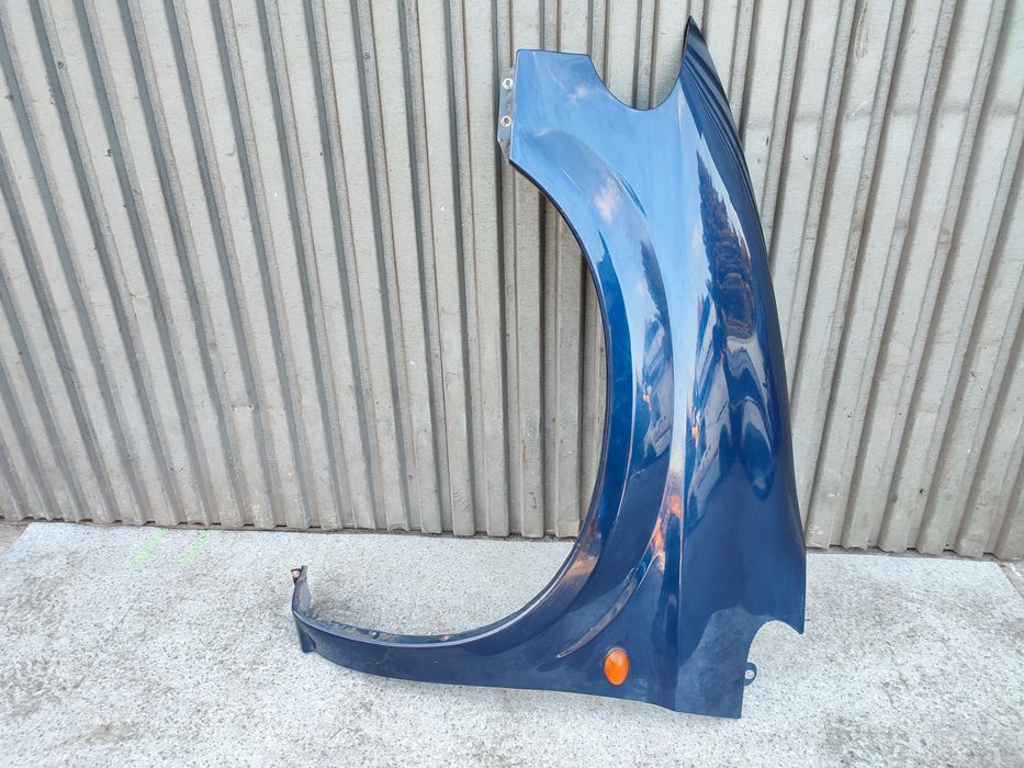 Chrysler Voyager IV 00-07r błotnik lewy przód przedni PB7