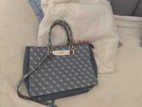 Mala marca Guess