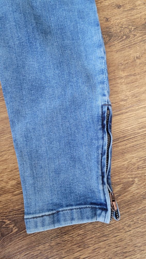 Spodnie damskie jeansowe z dziurami SikSilk M