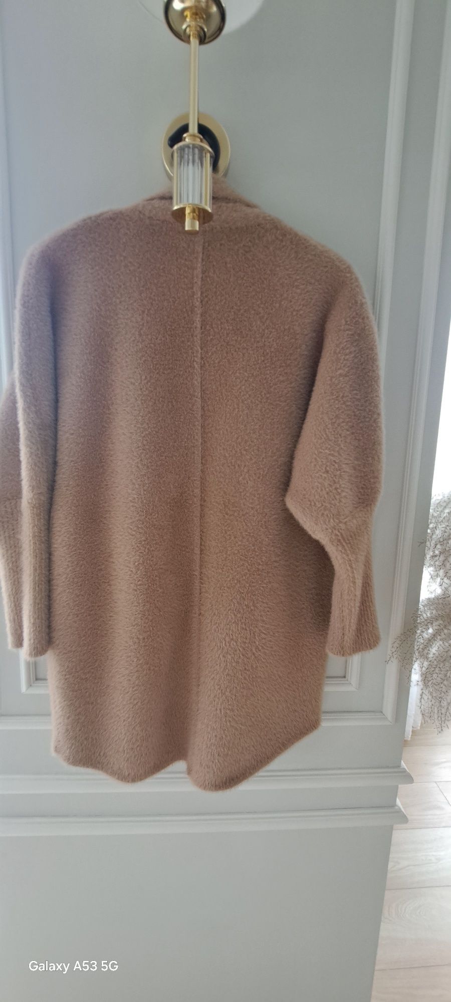 Śliczny sweter w roz 44
