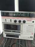 Radio cassete Sharp.