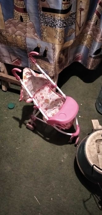 Детская игрушечная коляска