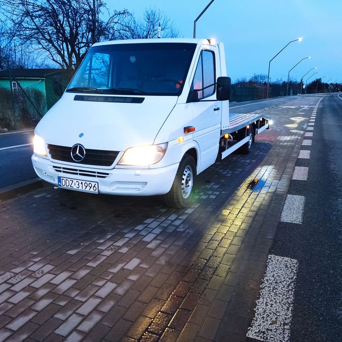 Pomoc drogowa holowanie laweta autolaweta