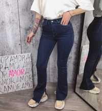 Джинси з розрізами 40, 42; джинсы синие с разрезами