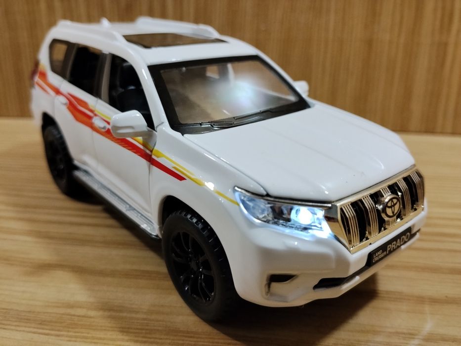 Модель Toyota Land cruiser Prado 1:32 автоэксперт металл свет звук ине