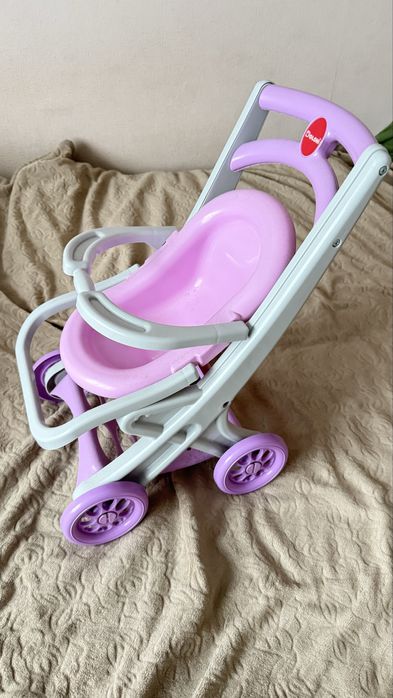 Пластикова коляска для ляльок doloni