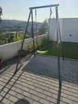 Baloiço de criança exterior