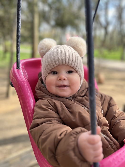 Зимова утеплена шапка