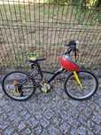 Bicicleta BTWIN racingboy 320 com capacete