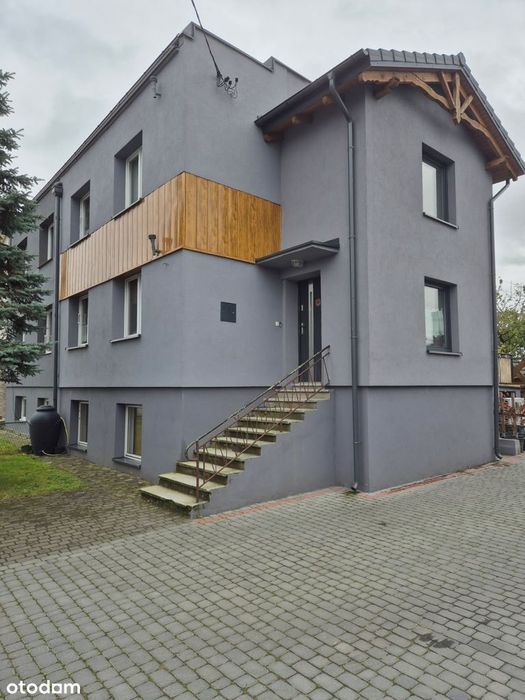 Dom  po remoncie z ogrodem