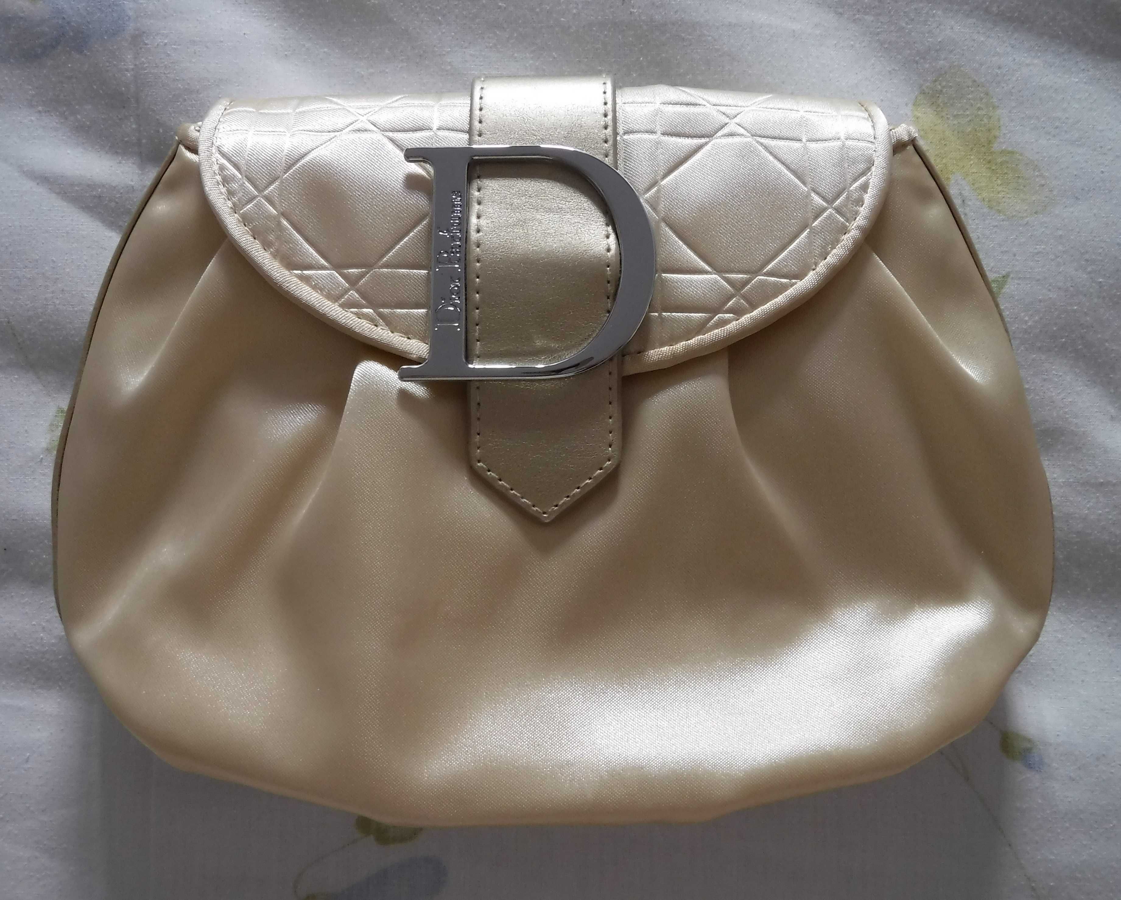 Pochete dourada, Dior, nova