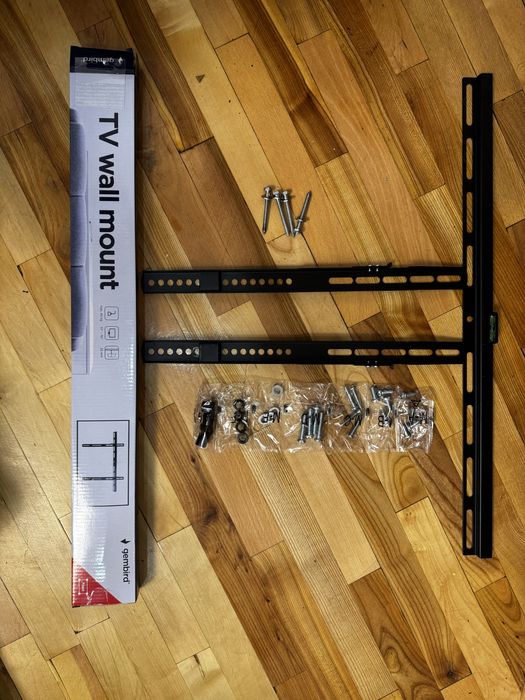 Кріплення для телевізора на стіну