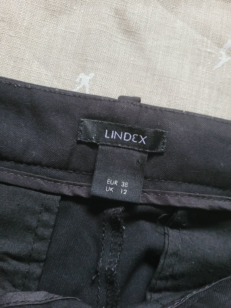 Czarne rozszerzane spodnie typu flare średni stan 38 M