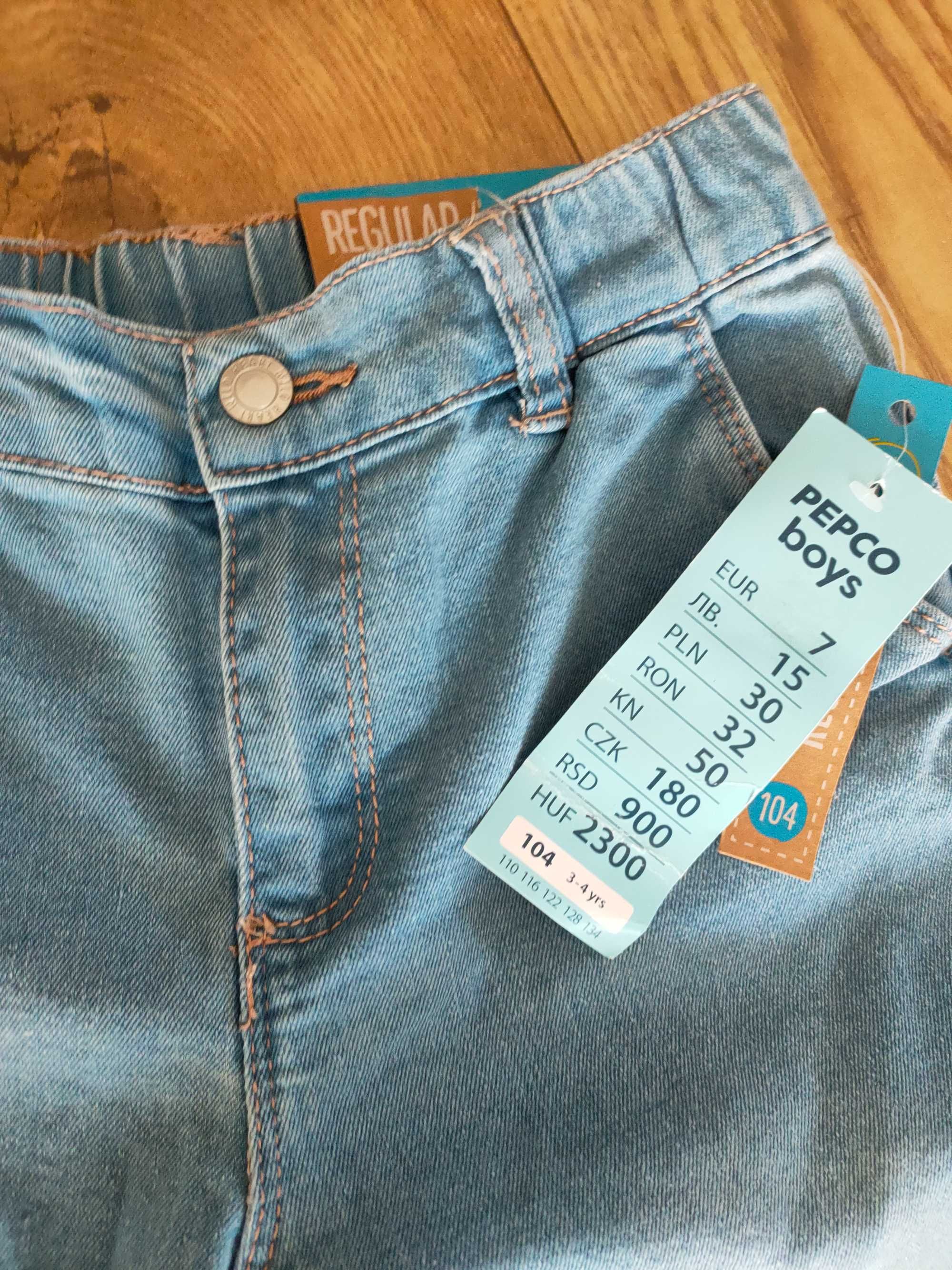 Nowe spodnie jeansowe dziecięce 104/110 jasnoniebieskie
