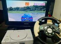 PS One + TV + Volante + 5 jogos