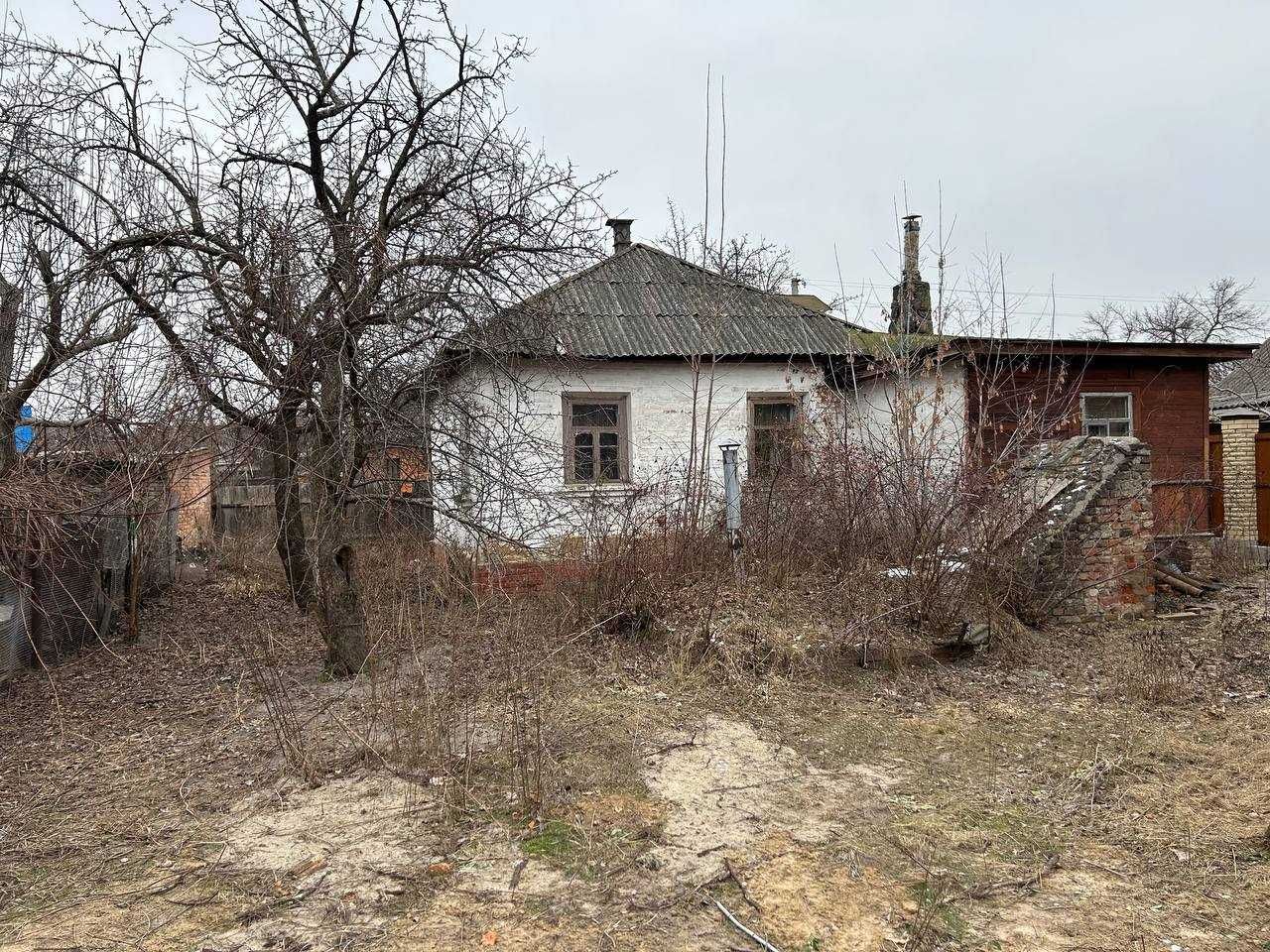 Продам земельну ділянку з будинком, в центрі міста