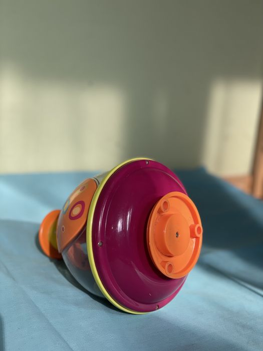 Розвиваюча іграшка, игрушка Battat Юла-мандаринка