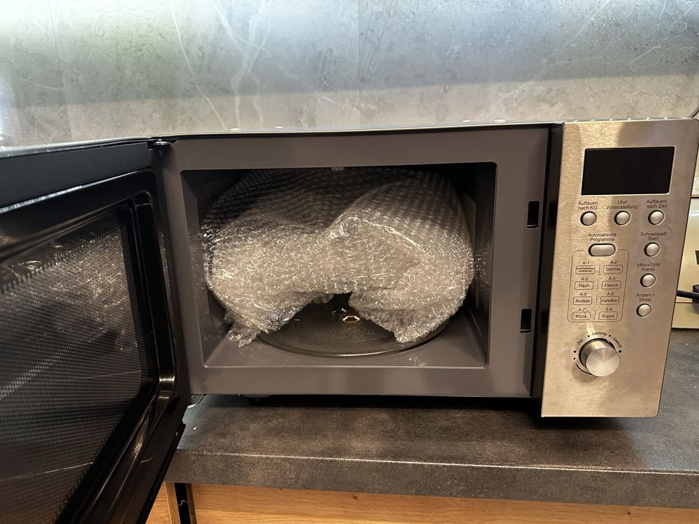 Exquisit microwave w. Grill UMW 800G-3 Inox