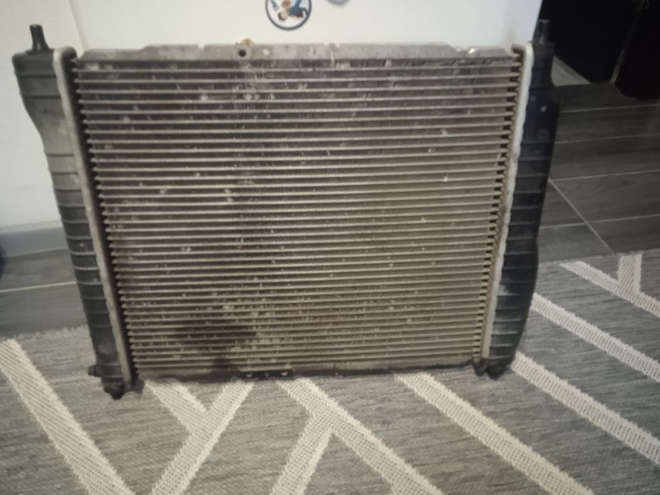 Продам радіатор Авео.