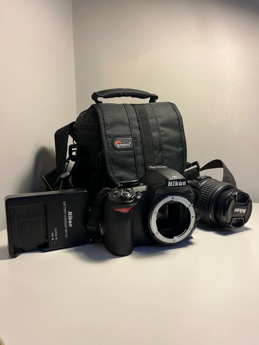 Nikon D3100 + Objetiva + Acessórios