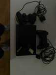PS2 Slim com dois comandos