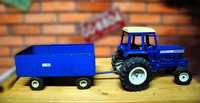 Zabytkowy Traktor ERTL FORD 7700 z Przyczepą ERTL The Big Blue, 1:12