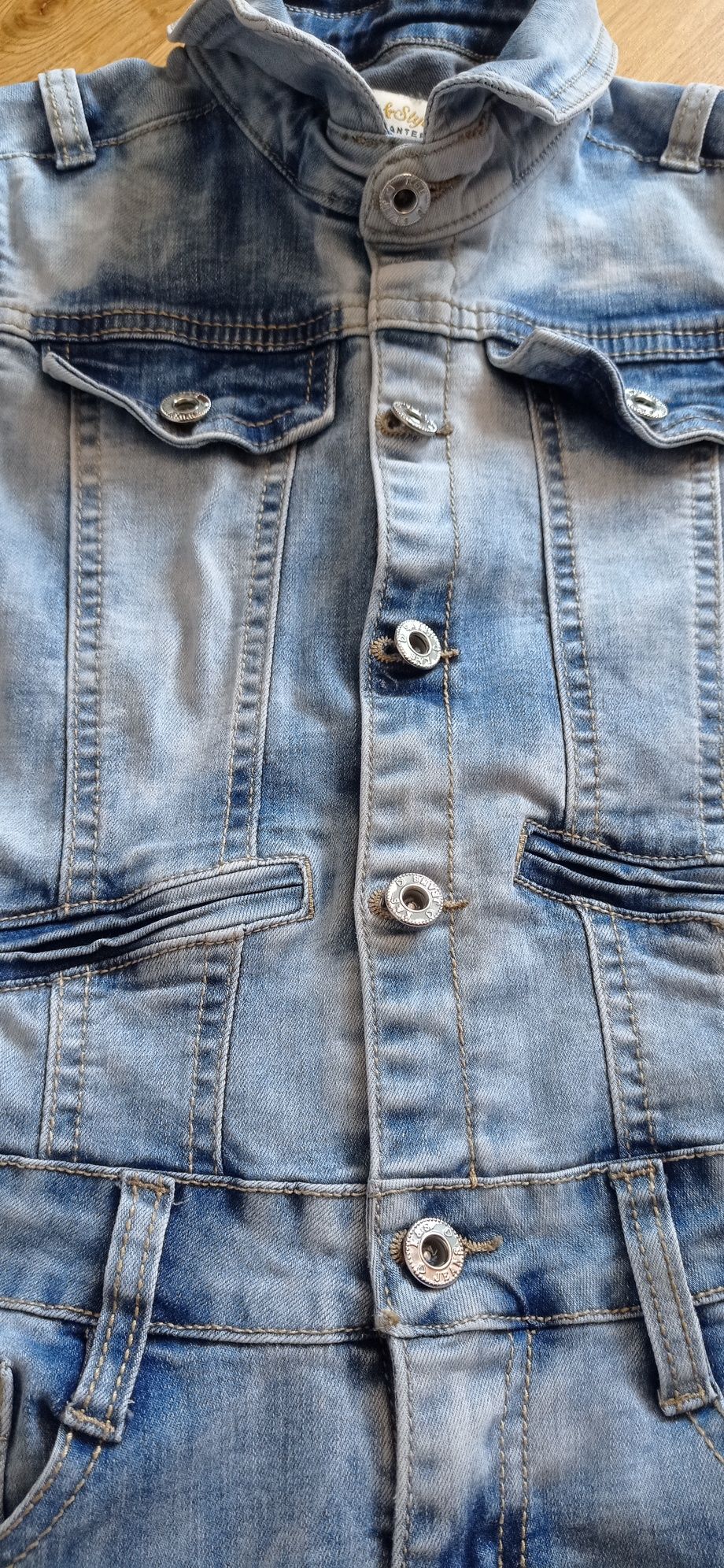 US Kids & Styl jasnoniebieski jeansowy kombinezon dziewczęcy r. 8 lat