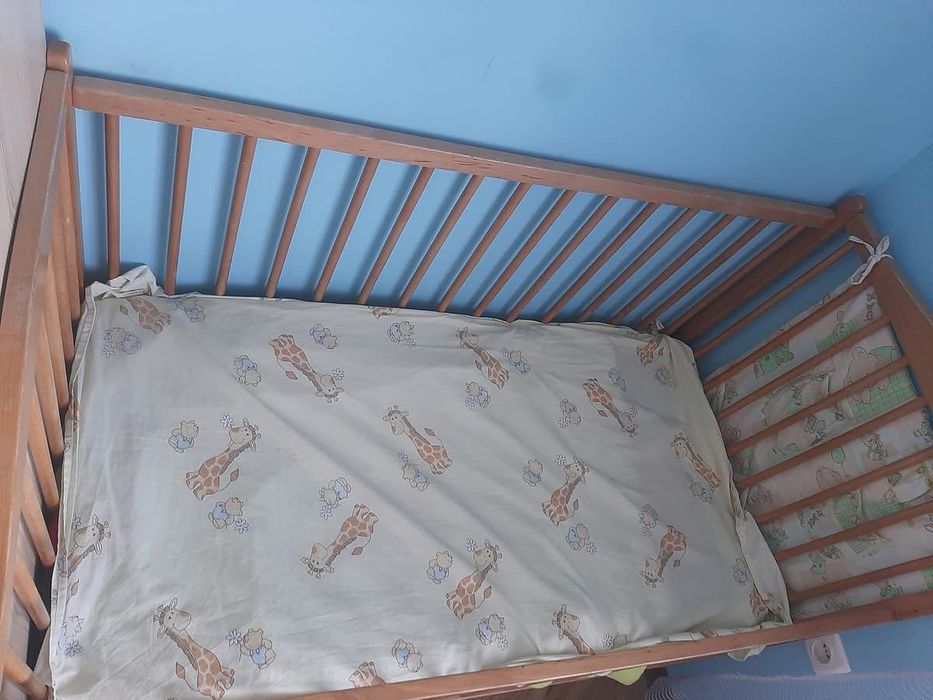 Дитяче ліжечко-колиска