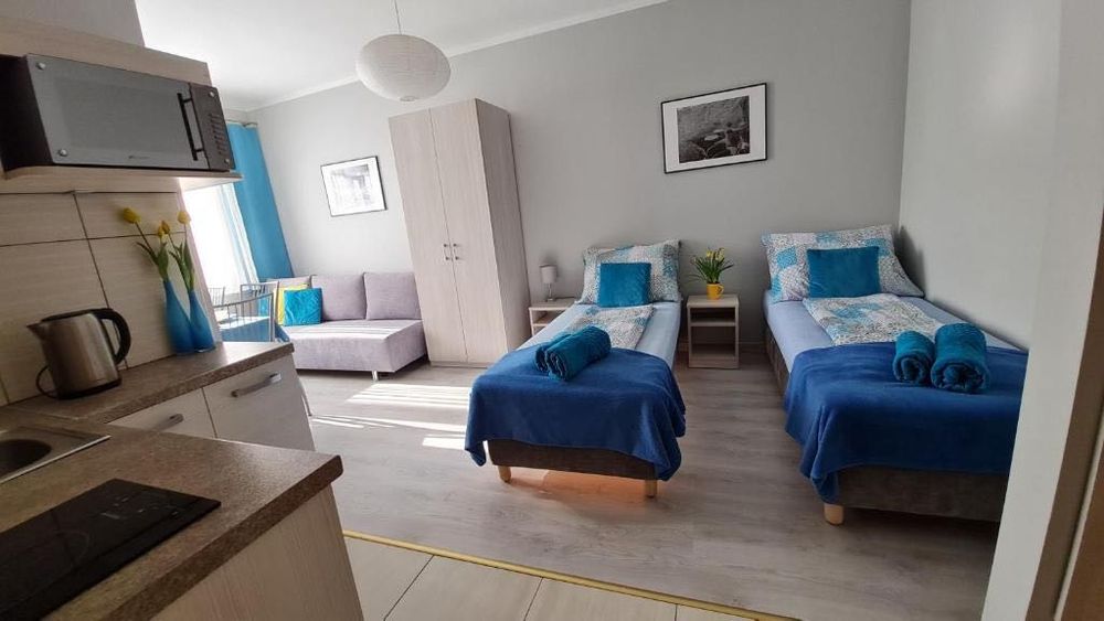 Bela-apartamenty, bezpłatny parking, faktura