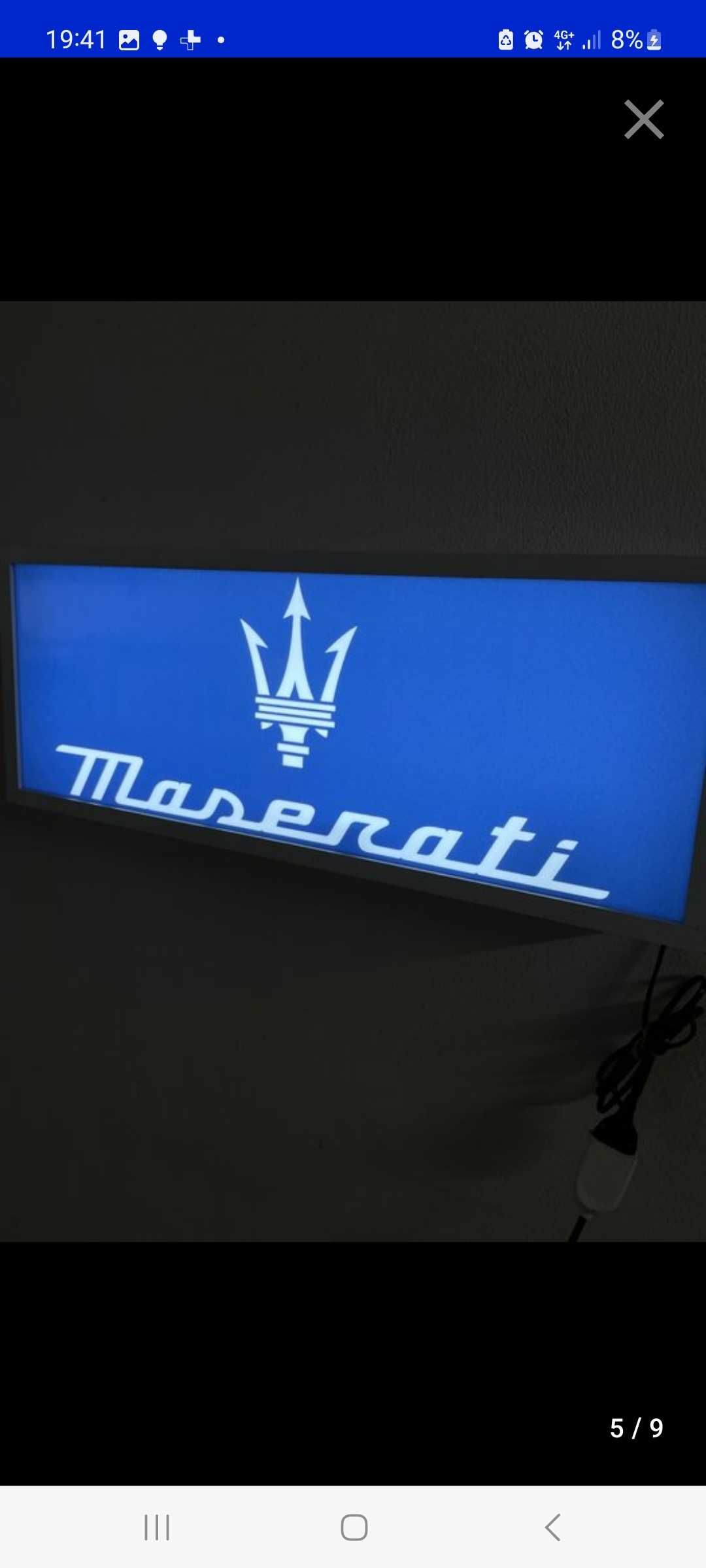 Sinal luminoso maserati